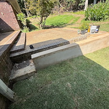 Retaining-Wall-Zoysia-Sod-Installation-Deck-Demolition-Romeo-and-Juliet-Balcony-Construction-in-Bartlett-TN 3