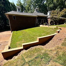 Retaining-Wall-Zoysia-Sod-Installation-Deck-Demolition-Romeo-and-Juliet-Balcony-Construction-in-Bartlett-TN 1